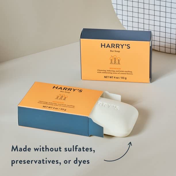 Harry's bar soap held in hand to show 4 oz size and easy handling