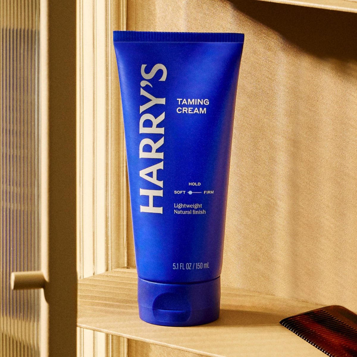Harry's cream dispensed on hands demonstrating easy spreadability and controlled application