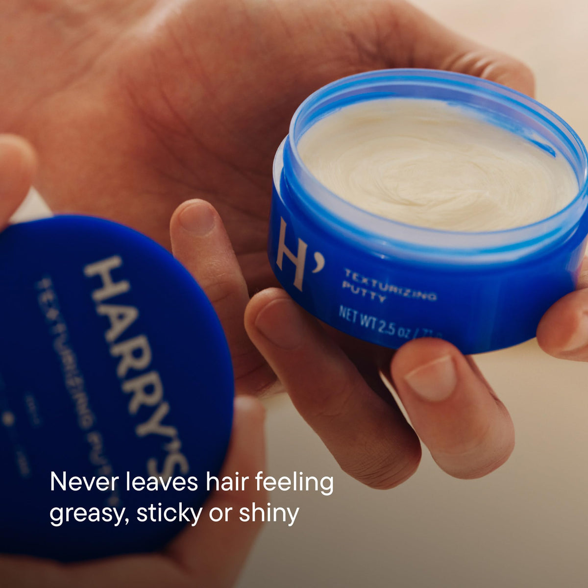 Close-up of Harry's putty texture demonstrating workable, non-greasy formulation benefit