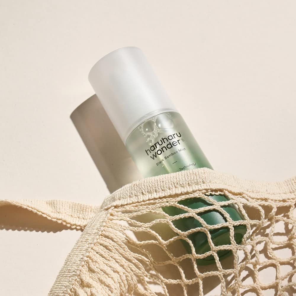 HARUHARU nozzle close-up demonstrating fine spray for even facial coverage