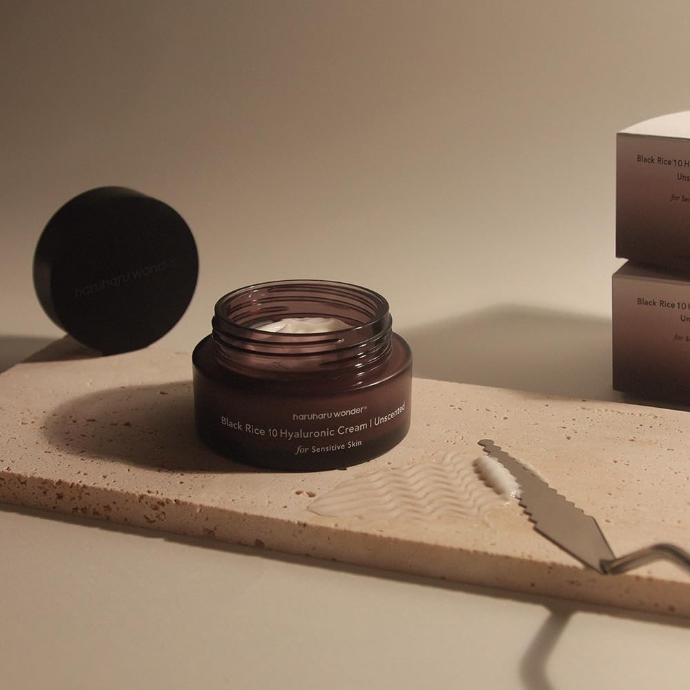 HARUHARU cream next to coin showing 1.6 fl oz size and travel-friendly