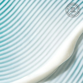 HASK open conditioner packette with creamy contents showing intense hydration and softness