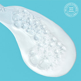 Foamy lather of HASK Argan Oil Repairing Shampoo demonstrating gentle cleanse
