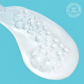 Argan oil drop texture close-up with HASK, illustrates nourishing ingredient