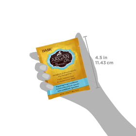HASK size comparison in hand to visualize single-treatment container and portioning