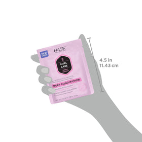 HASK bottle held in hand to show size and travel‑friendly convenience