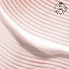 HASK being applied in shower to wet hair for deep conditioning treatment