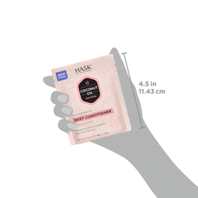 HASK packet beside a coin to show single-use travel-friendly size