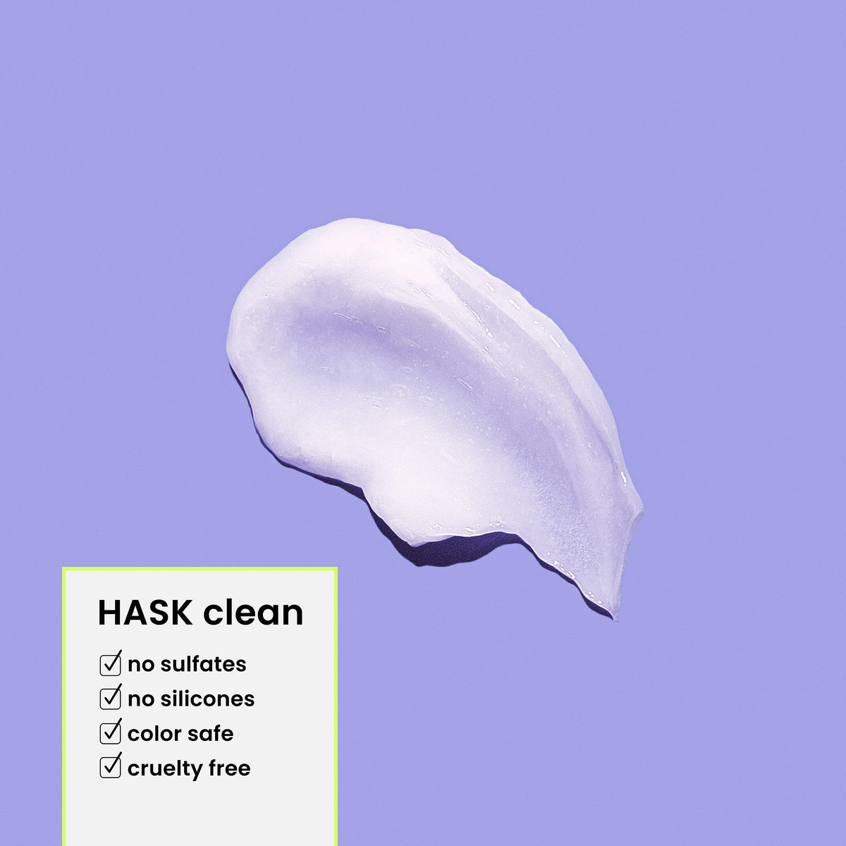 HASK conditioner smoothing through hair to show detangling benefit