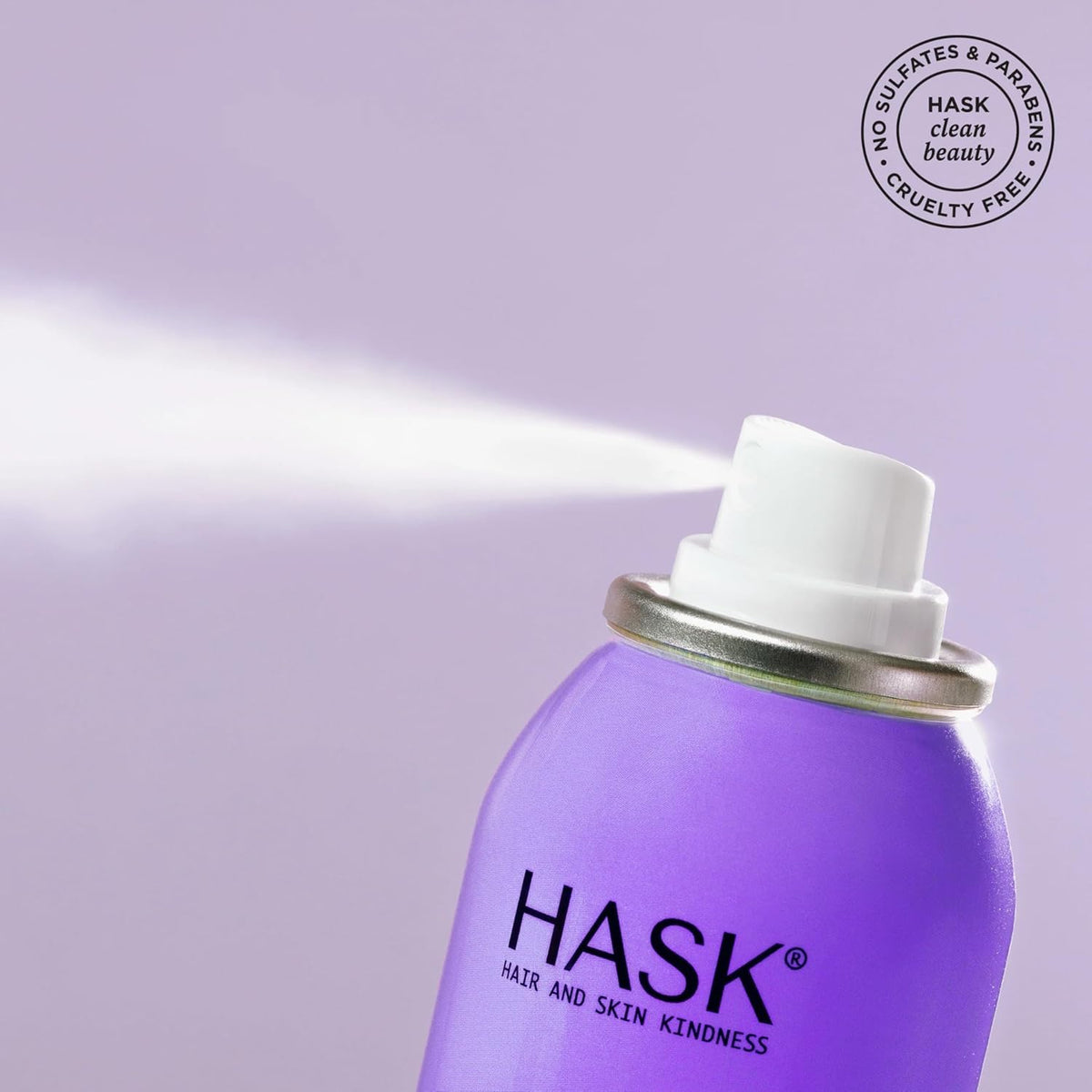 HASK dry shampoo dusted on a brush demonstrating lightweight oil absorption for fuller hair