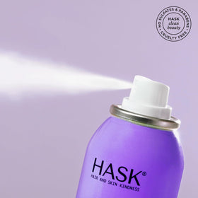 HASK dry shampoo dusted on a brush demonstrating lightweight oil absorption for fuller hair