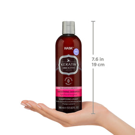 HASK 12 fl oz bottle beside a ruler for clear size and travel-friendly scale