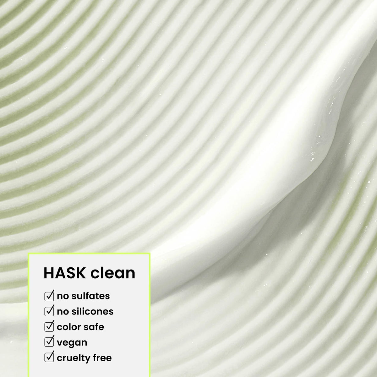 HASK being applied to wet hair to detangle and deeply condition strands
