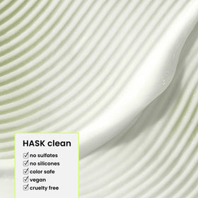 HASK being applied to wet hair to detangle and deeply condition strands