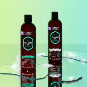 HASK bottle with recycling symbols and product information