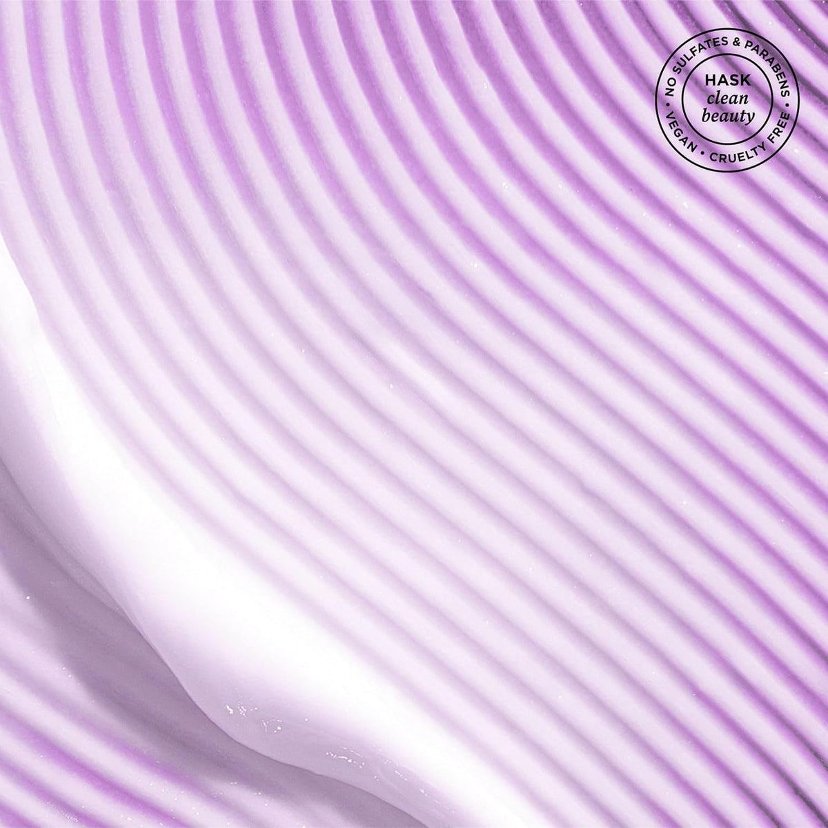 HASK texture shot showing spray on hair strand to illustrate smoothing and shine