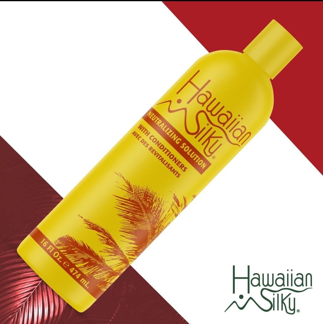 Hawaiian Silky 16 fl oz bottle next to a ruler showing size and travel-friendly capacity