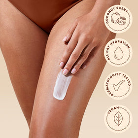 Hawaiian Tropic bottle in hand showing 12.6 fl oz size and travel ease