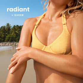 Hawaiian Tropic bottle label detail highlighting SPF 50 and oxybenzone-free benefit