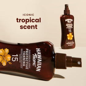 Hawaiian Tropic dry oil texture close-up illustrating lightweight hydration