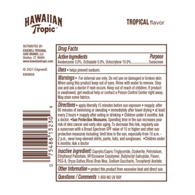 Hawaiian Tropic lip balm in beach bag highlighting on-the-go sun protection