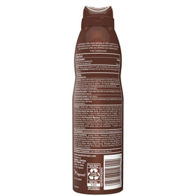 Hawaiian Tropic bottle styled on a beach towel conveying tropical lifestyle