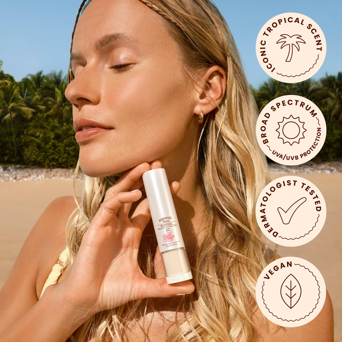 Hawaiian Tropic powder applied over makeup to set foundation and protect
