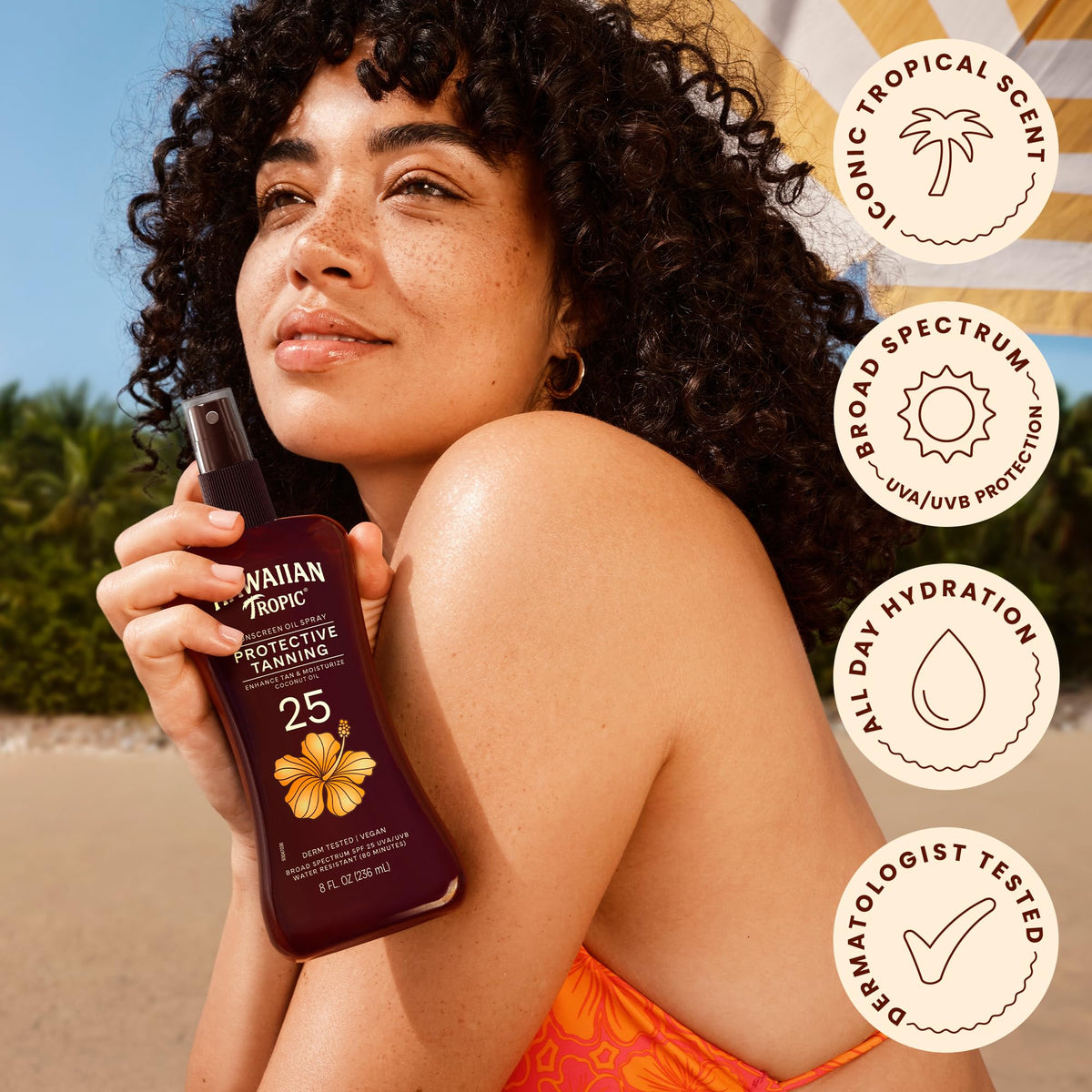 Hawaiian Tropic bottle next to sunglasses for scale showing convenient 8 fl oz size