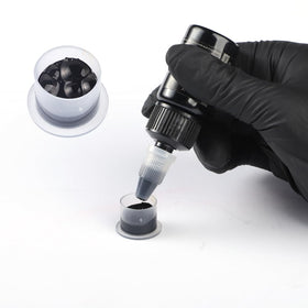 HAWINK in use by artist hand showing precise lining and controlled ink flow