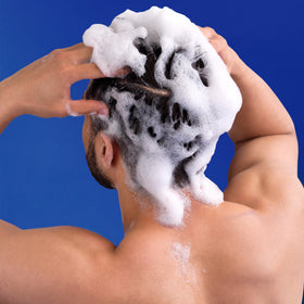 Head & Shoulders in-shower scene illustrating quick 2-in-1 cleanse and rinse routine