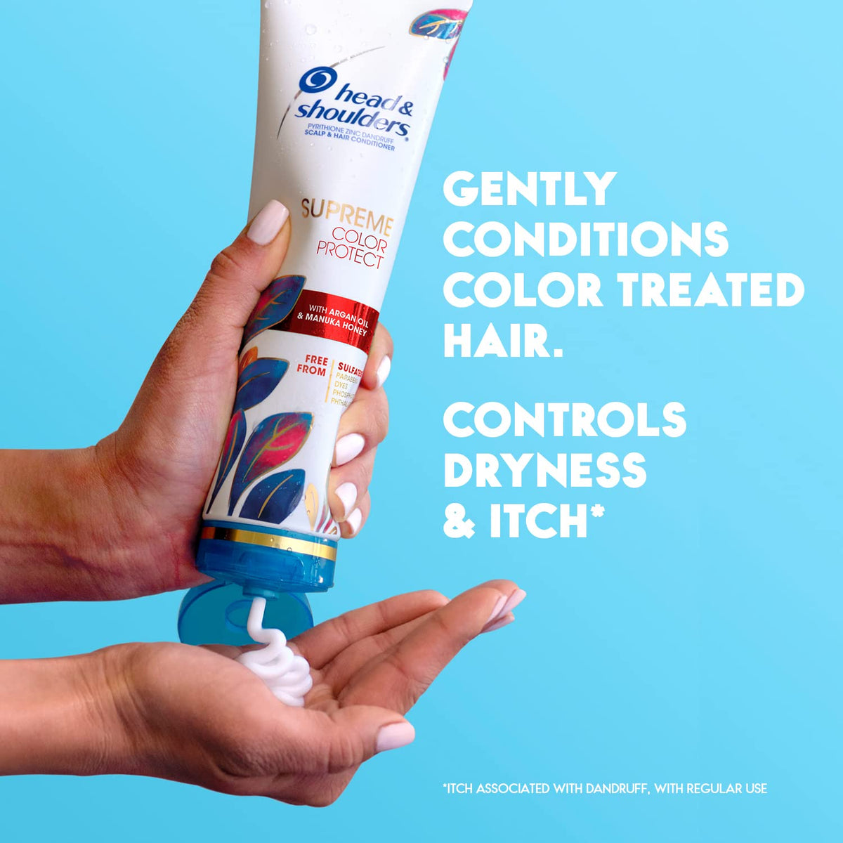 Head & Shoulders bottle in hand for size comparison and travel convenience