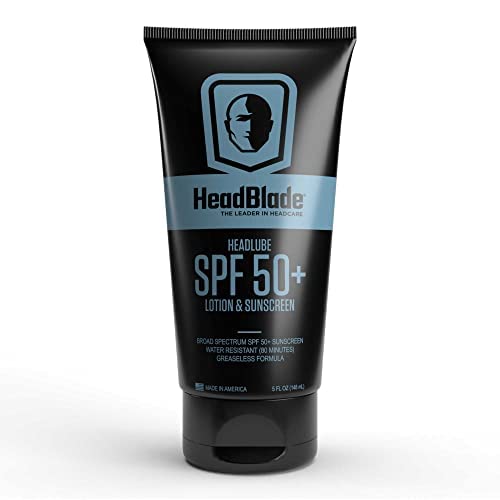 Person using HeadBlade HeadLube on scalp at beach for reliable sun defense