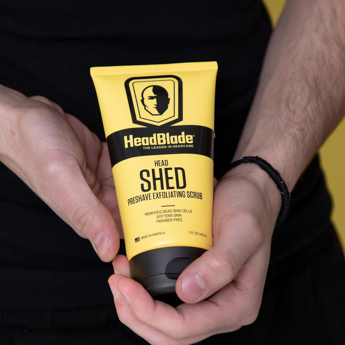 applying HeadShed to scalp before shaving to reduce tugging and improve razor glide