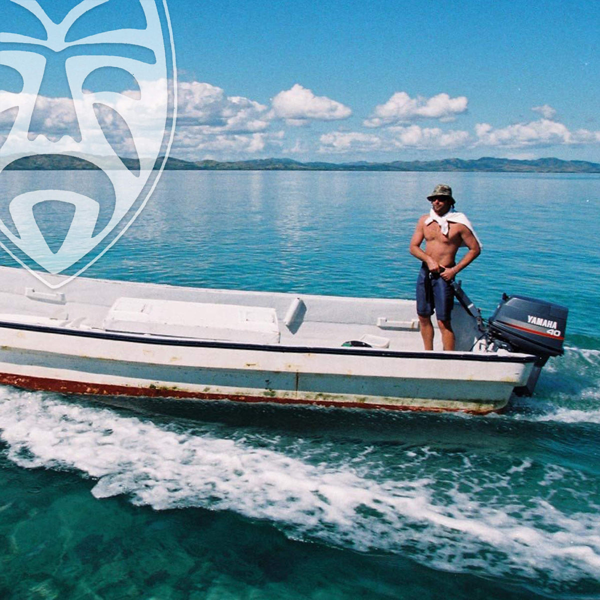 Headhunter on surfboard lifestyle scene showing water-resistant protection benefit