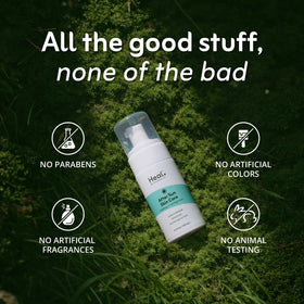 Heal by InnovaCorium travel size beside sunglasses showing beach-ready convenience