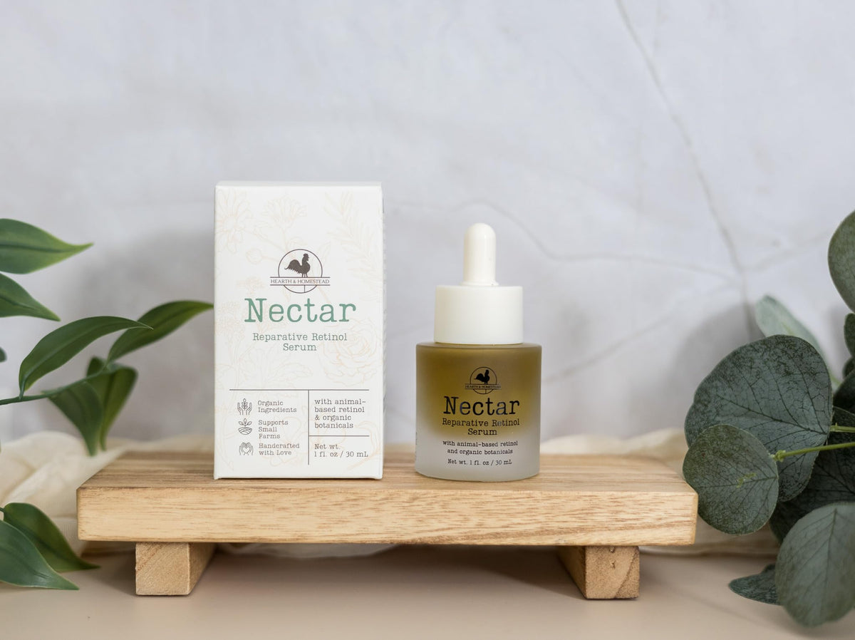 Hearth and Homestead applying serum at night for restorative skin nourishment
