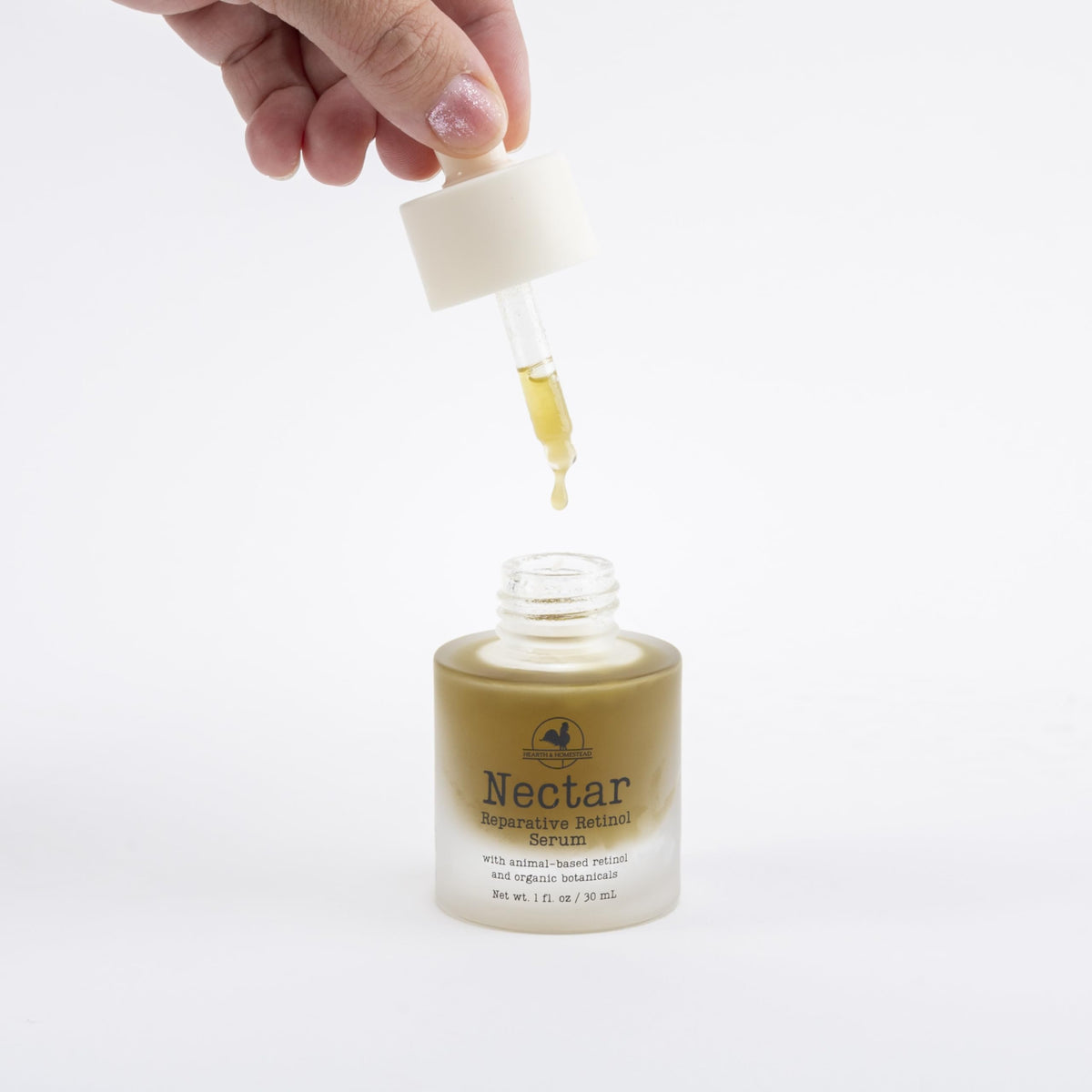 Hearth and Homestead label close-up listing fermented cod liver oil benefits