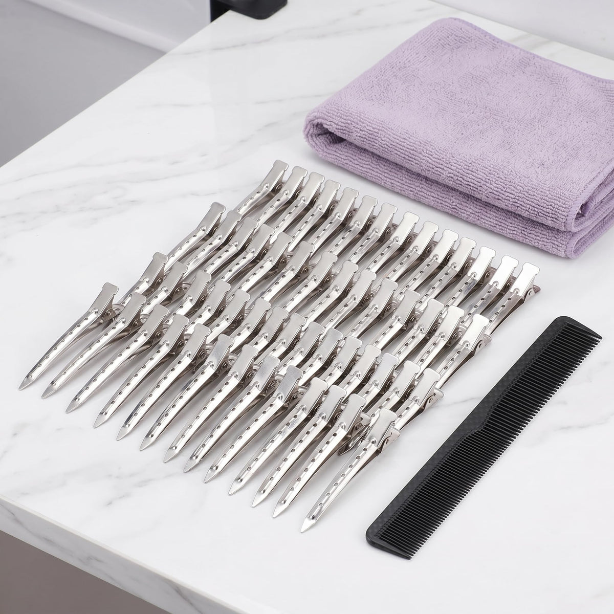 Hedume clips arranged on salon station for efficient professional use