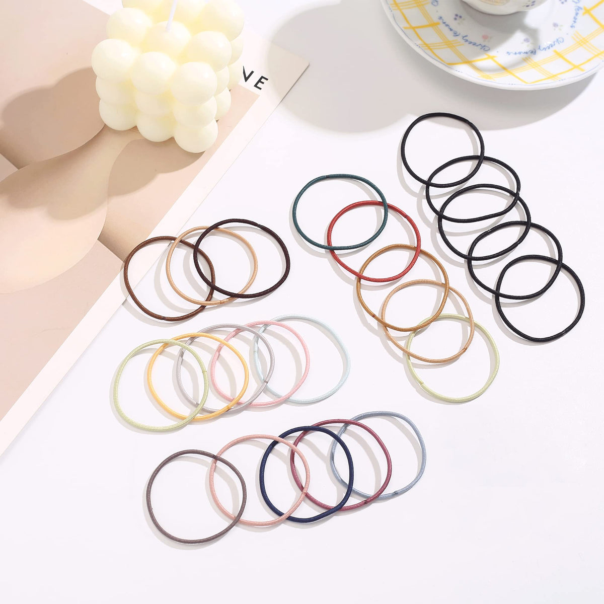 Helamvly hair tie beside ruler showing 1.57 inch diameter scale