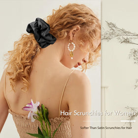 Helamvly scrunchie styled in elegant updo at a wedding for polished look