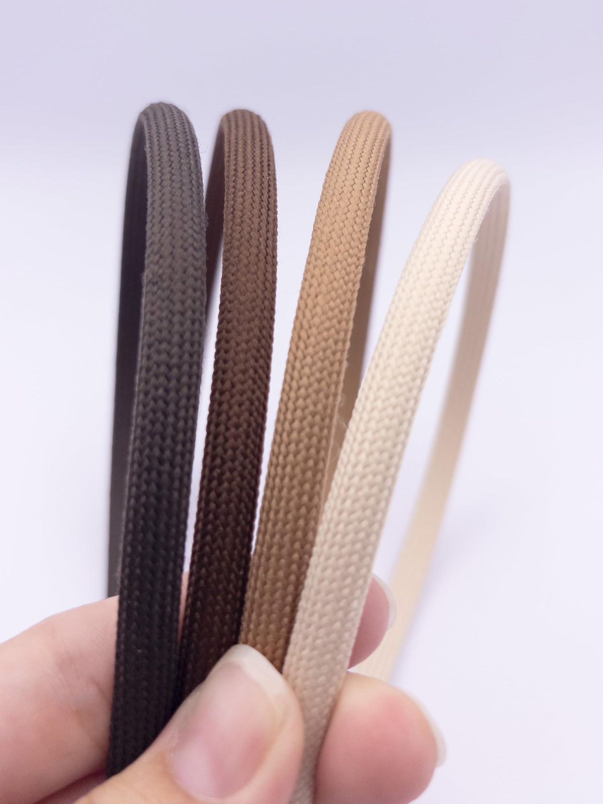 Heliums close-up of textured fabric highlighting matte finish and gentle grip for comfort