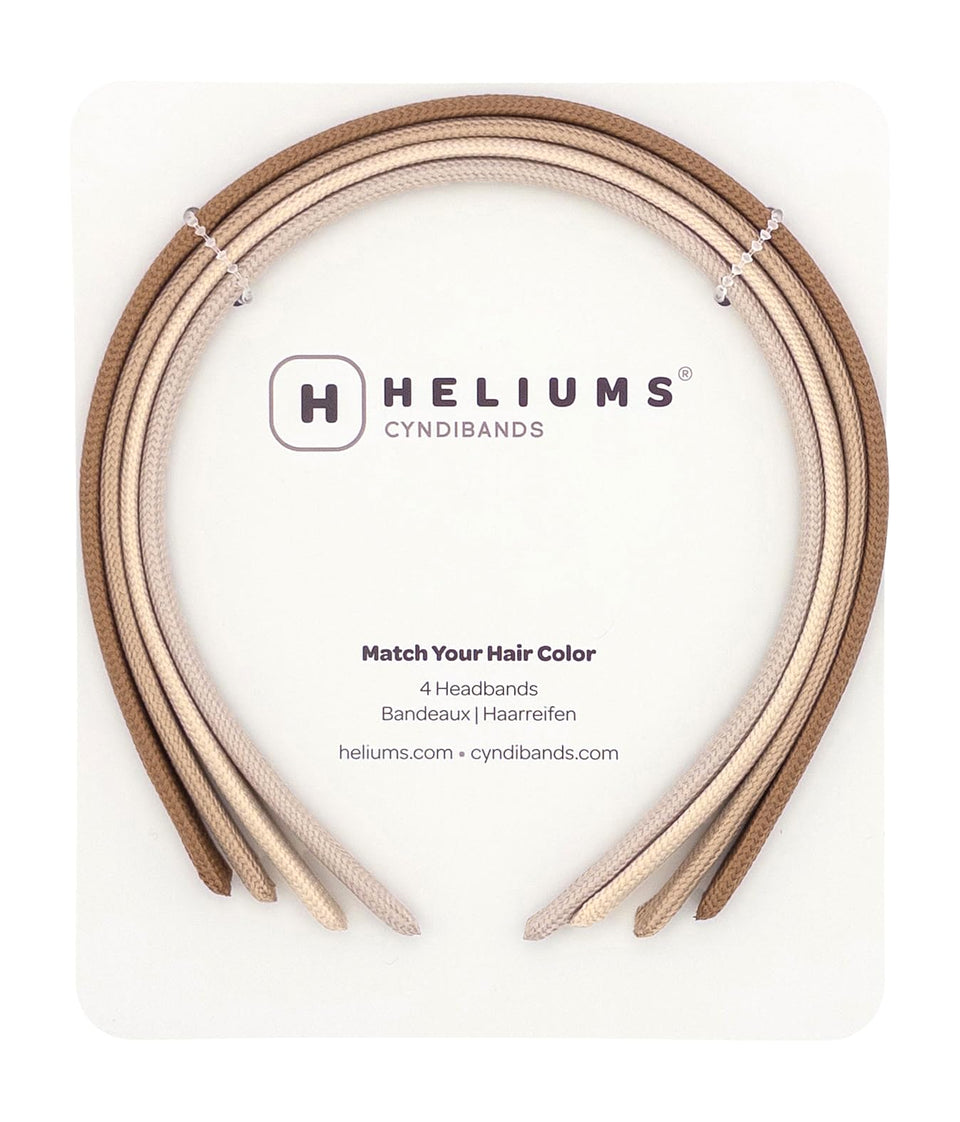 Heliums front pack view showing four neutral skinny headbands for subtle hold