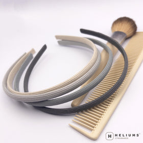 Heliums off-white headband in blonde hair adding subtle contrast