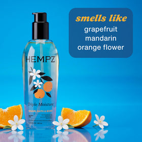 Hempz oil being dispensed on hand demonstrating easy application and moisturizing
