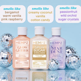 Hempz trio arrangement of Glow Getter Star Dust Spun Sugar displaying color and bottle design benefits