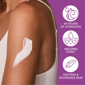 Applying Hempz lotion to hands to show hydration and softened skin benefit