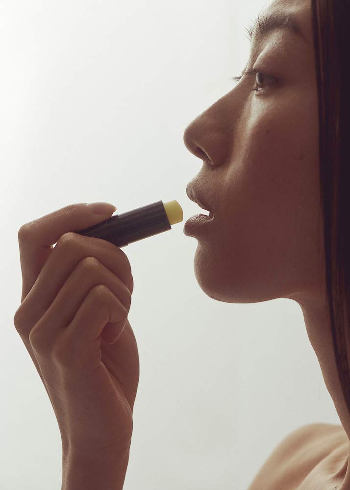 Henné Organics tube placed on a vanity to illustrate daily use and style