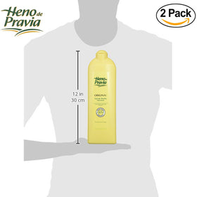 Heno de Pravia bottle placed in shower demonstrating convenience and daily use