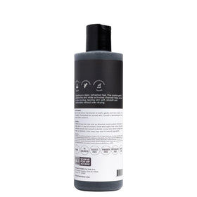 Her Fantasy Box foam on hand rinsing off to show cleansing and smooth-skin benefit