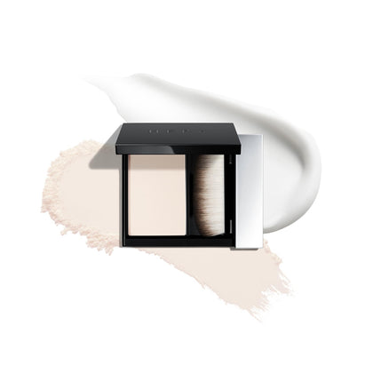 HERA front packaging showing compact travel-friendly primer and brush benefit